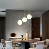 Modern Triple Globe Glass Pendant Light Adjustable Cord Image - 6