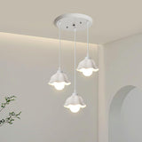 Modern Triple White Ceramics Flower Pendant Light Image - 1