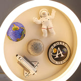 Modern White Astronaut-Themed Circular LED Table Lamp Image - 4