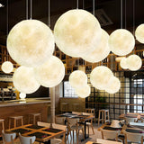 Modern White Resin Globe Moon Pendant Light Flexible Length Image - 4