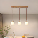 Modern Wood 3-Light Glass Globe Island Pendant Light Image - 4