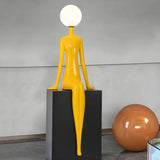 Modern Yellow Statue Abstract Resin LED Floor Lamp Image - 1