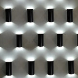 Modish Cylinder Black Exterior Up Down Wall Sconce Image - 1