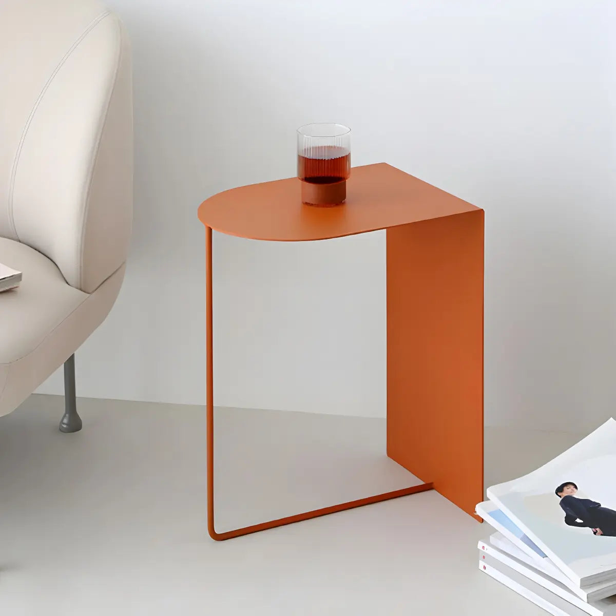 Modish Standard Curved Orange Metal Base Side Table Image - 1