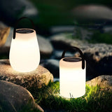 Portable Solar Black Cylinder Outdoor Table Lamp Image - 1