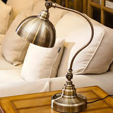 Retro Brass Arc Metal Table Lamp with Rocker Switch Image - 3