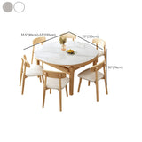 Scandinavian Round Stone Dining Table Self-Storing Leaf Image - 11