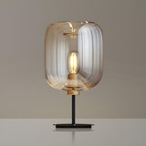 Simple Amber Drum Glass Shade Black Base Table Lamp Image - 6