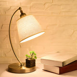 Simple Barrel Fabric Shade Curved Arm Bronze Table Lamp Image - 1