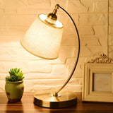 Simple Barrel Fabric Shade Curved Arm Bronze Table Lamp Image - 3