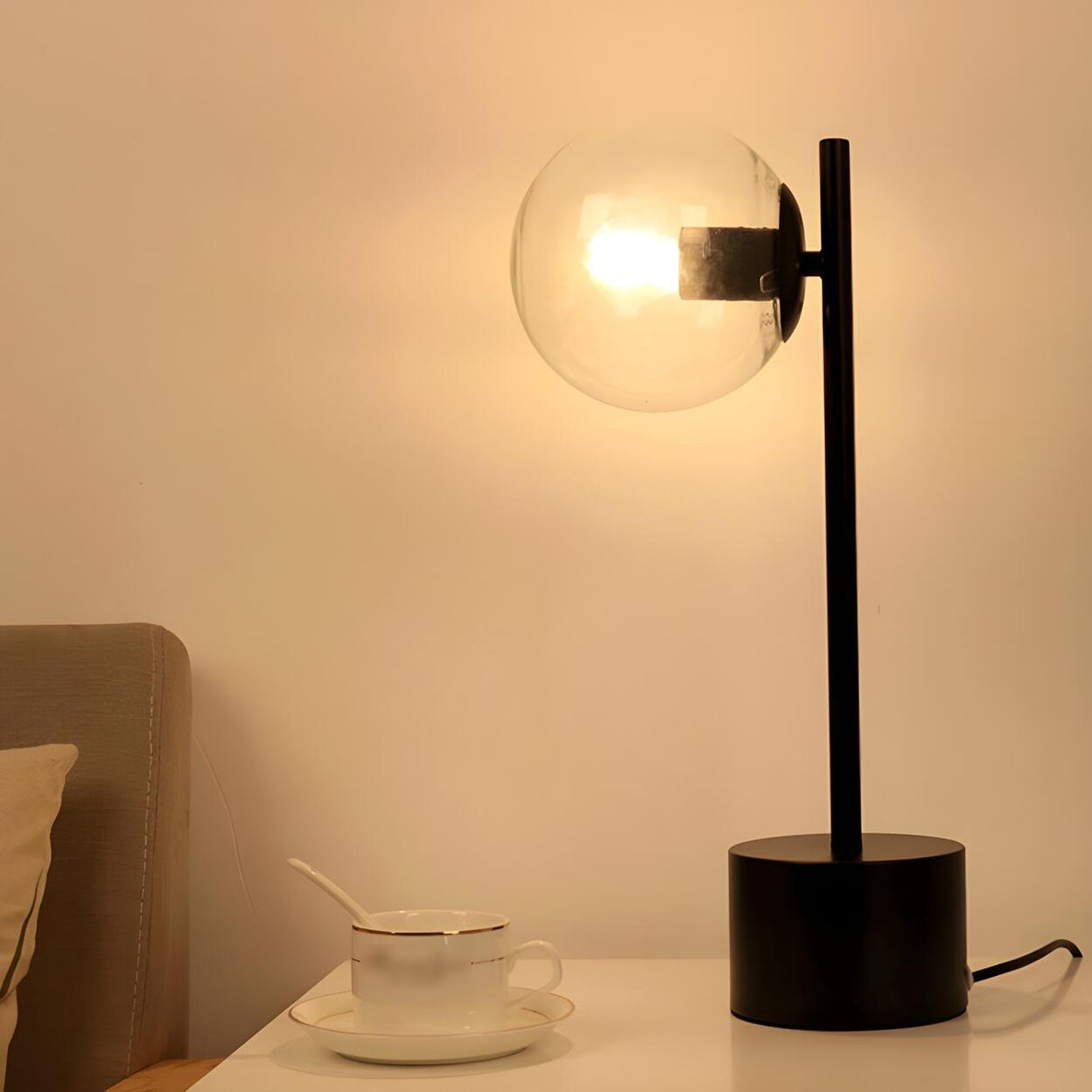 Simple Black Cylinder Base Glass Ball Shade Table Lamp Image - 1