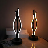 Simple Chic Bedroom Black LED Strip Metal Table Lamp Image - 2