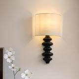 Simple Cylinder White Fabric Curved Base Wall Sconce Image - 1