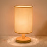 Simple Cylindrical Fabric Shade Wooden Base Table Lamp Image - 5