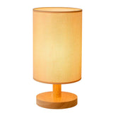 Simple Cylindrical Fabric Shade Wooden Base Table Lamp Image - 9