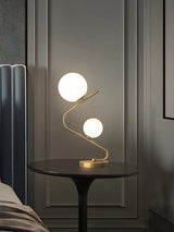 Simple Dual Opal Glass Globes Brass Curved Table Lamp Image - 13