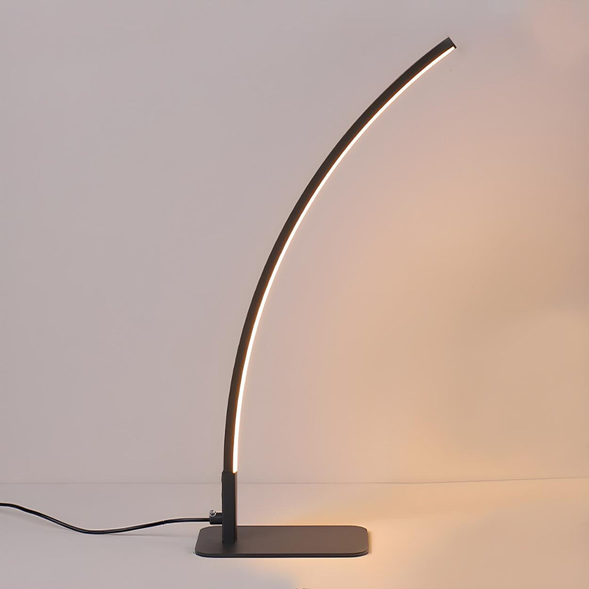 Simple Elegant Curved Linear LED Metal Table Lamp Image - 7