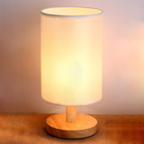 Simple Fabric Cylinder Shade Wooden Base Table Lamp Image - 19