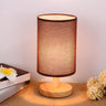 Simple Fabric Cylinder Shade Wooden Base Table Lamp Image - 2