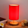 Simple Fabric Cylinder Shade Wooden Base Table Lamp Image - 3