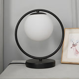 Simple Geometric Metal Frame White Glass Table Lamp Image - 15