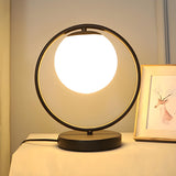 Simple Geometric Metal Frame White Glass Table Lamp Image - 2