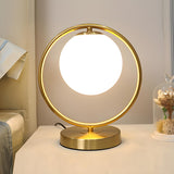 Simple Geometric Metal Frame White Glass Table Lamp Image - 3