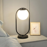 Simple Geometric Metal Frame White Glass Table Lamp Image - 8