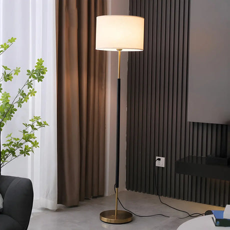 Simple Modern Drum Shade Gold and Black Floor Lamp Image - 1