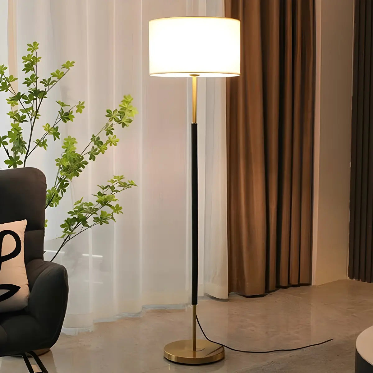 Simple Modern Drum Shade Gold and Black Floor Lamp Image - 2