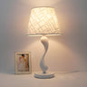 Simple Nordic White Fabric Curved Metal Base Table Lamp Image - 1