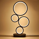 Simple Stylish Black Round 4 Lights LED Table Lamp Image - 6