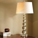 Simple White Fabric Crystal Ball Tower Base Table Lamp Image - 2