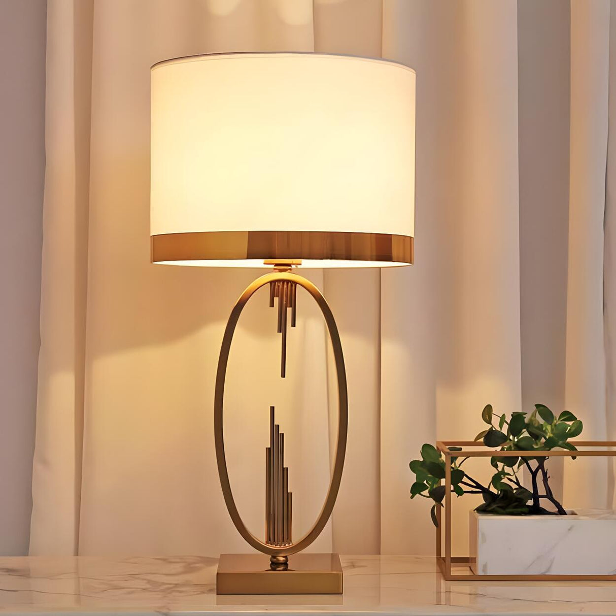 Simple White Fabric Shade Gold Oval Frame Table Lamp Image - 1