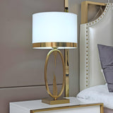 Simple White Fabric Shade Gold Oval Frame Table Lamp Image - 3