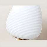 Simple White Oval Glass Lantern Bedside Table Lamp Image - 11