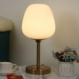 Simple White Oval Glass Lantern Bedside Table Lamp Image - 6