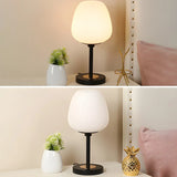 Simple White Oval Glass Lantern Bedside Table Lamp Image - 9