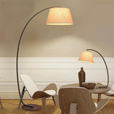 Sleek Bedroom Cylinder Shade Arc Metal Floor Lamp Image - 4