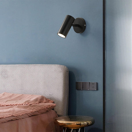 Sleek Black Cylinder Bedside Adjustable Wall Sconce Image - 1