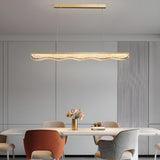 Sleek Gold Linear and Wavy Island Hanging Light Image - 2