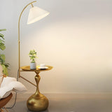 Sleek Pleated Gold Arched Floor Lamp with Side Table Image - 5