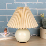 Sleek spherical ceramic pleated lampshade table lamp Image - 4