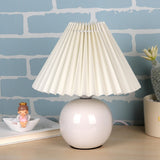 Sleek spherical ceramic pleated lampshade table lamp Image - 5