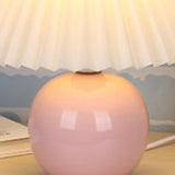 Sleek spherical ceramic pleated lampshade table lamp Image - 9