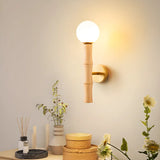 Small Bamboo-Inspired Round LED Globe Wall Sconce Image - 1