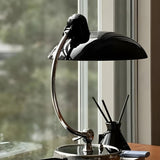 Stylish Black Domed Curved Metal Arm Modern Table Lamp Image - 4