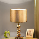 Stylish Geometric Hollow Shade Metal Base Table Lamp Image - 2