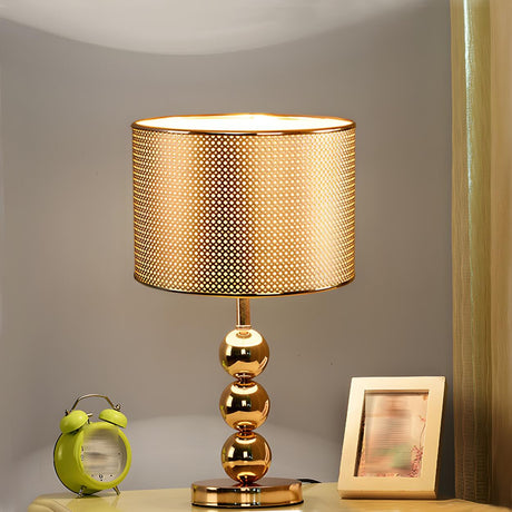 Stylish Geometric Hollow Shade Metal Base Table Lamp Image - 2