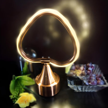 Stylish Golden Geometric Cone Base Metal Table Lamp Image - 1